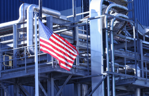 American flag outside of factory