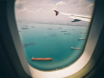 Cargo Ships in view from an airplane