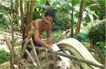 Man creating manila rope material