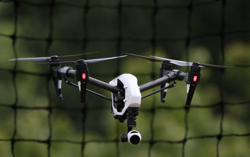 Drone inside of flight cage