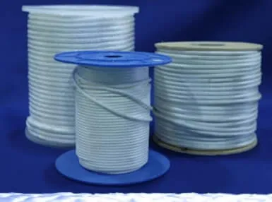 White polyester rope spools on blue background