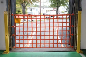 front view of a post mounted loading dock safety net